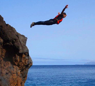 Costeering activity - rock jumping - Madeira
